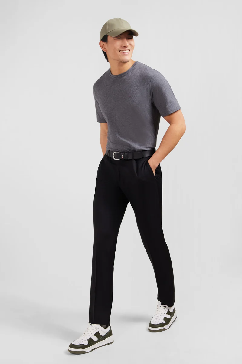 Pantalon slim noir en laine à plis cassés