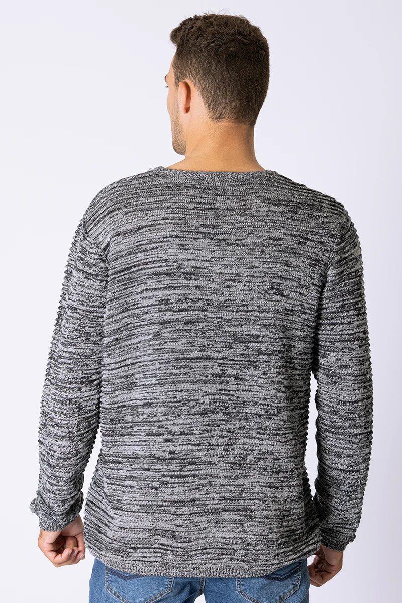 Le chandail en tricot texturé